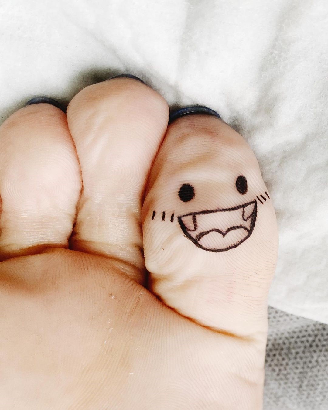 Smiley Face Toe Tattoo 