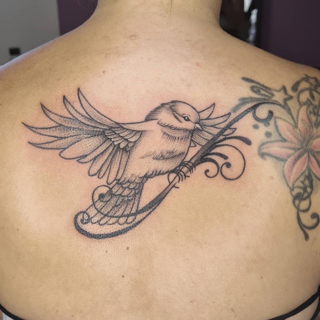 Sparrow Tattoo On Back