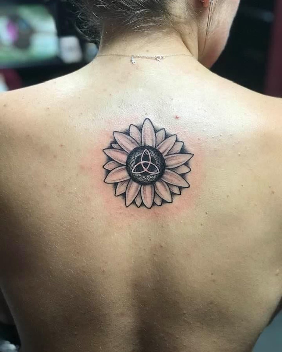 flower tattoo design on back women