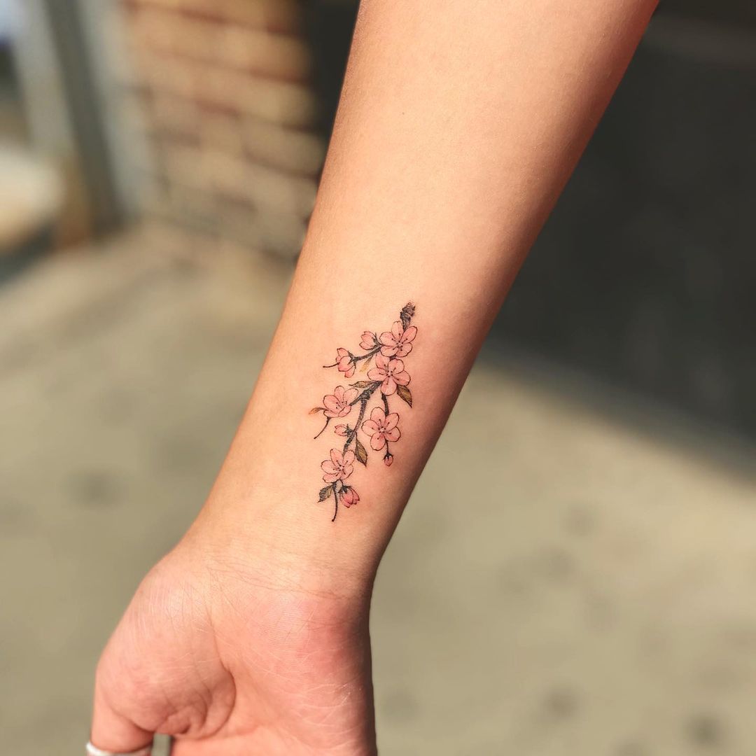 flower wrist tattoo women