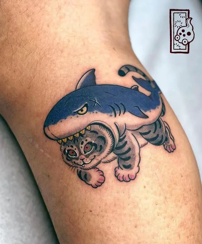 A Cat In A Sharks Costume Tattoo Design