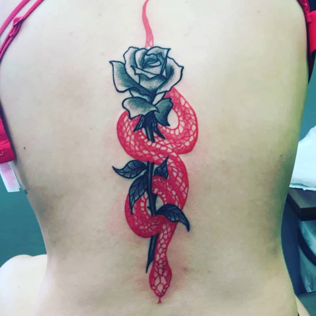Dragon Wrapped Around A Rose Tattoo Design