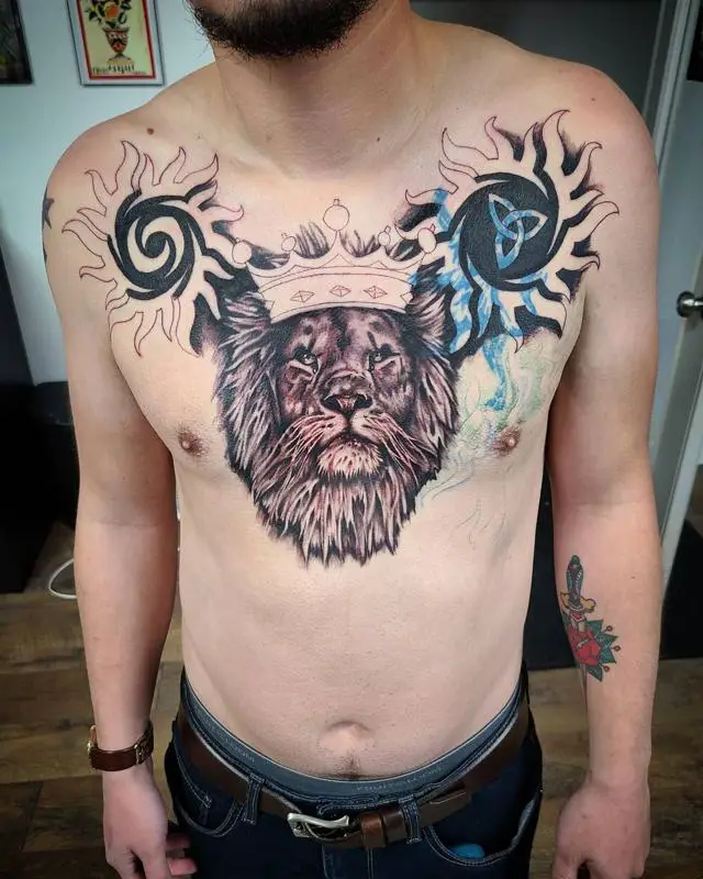 Lion With Crown On Chest Tattoo 1