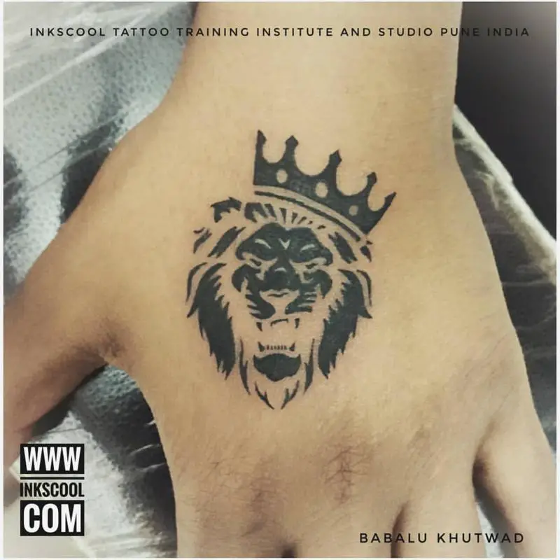 Lion With Crown Tattoo On Hand 3