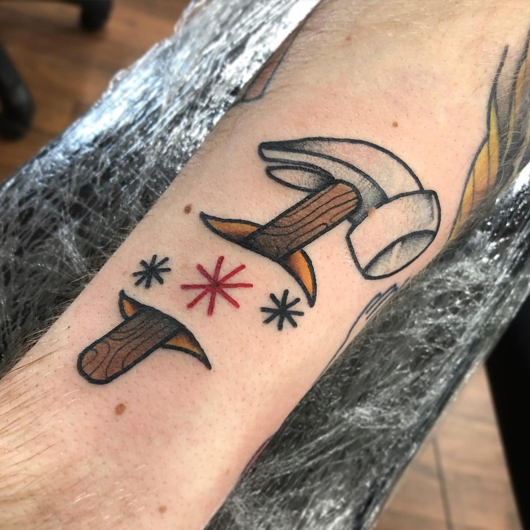 Unique Artsy Hammers Tattoo