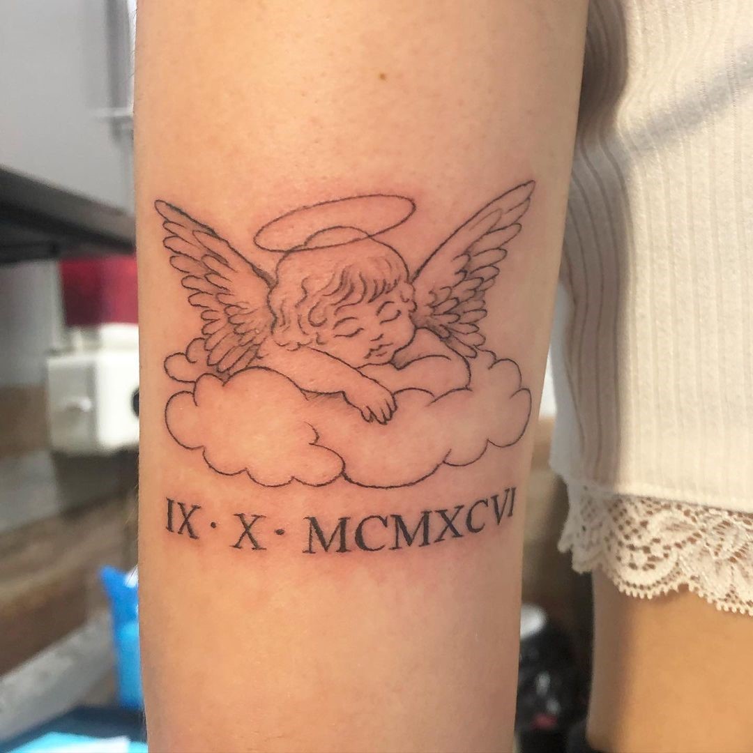 Angel Inspired Tattoo With Roman Numerals