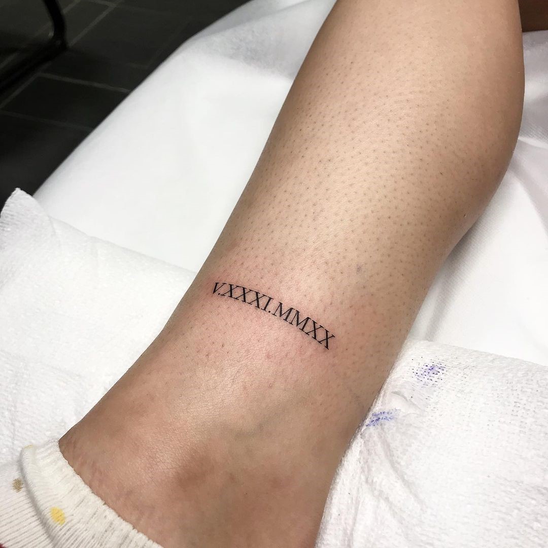 Small Ankle Roman Numeral Tattoo