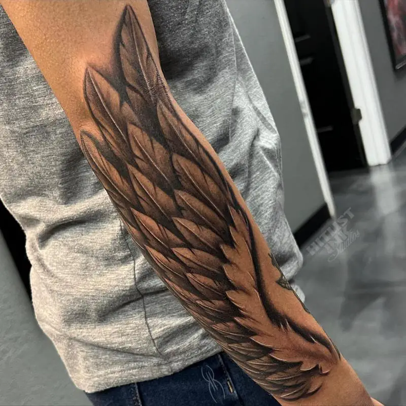 Forearm Wing Tattoo Meaning